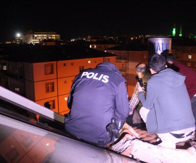 Uzaklaştırma cezası alan koca, 5 katlı binanın çatısına çıktı