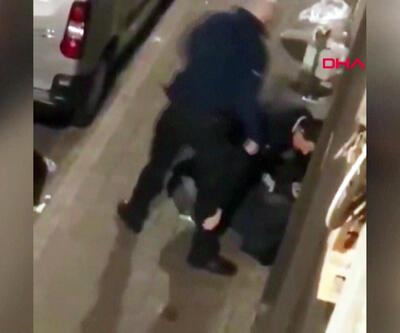 Belçika polisi kelepçeli şüphelinin kafasını tekmeledi