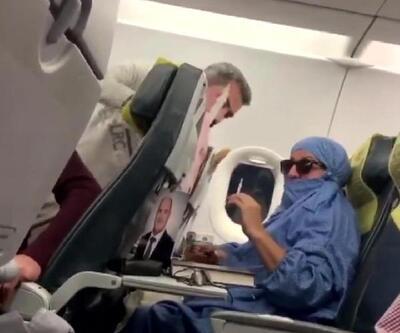 Uçakta 'FETÖ'cüyüm' diye bağıran kadının oğlu tanıdık çıktı