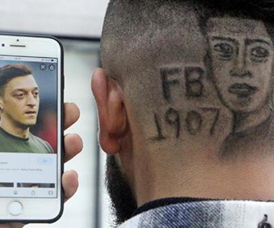 Berberden 3 boyutlu saç tıraşı hizmeti; Mesut Özil'in portresini başına işletti  