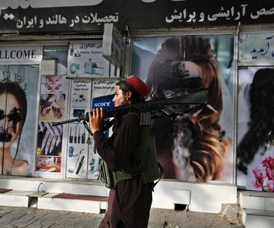 Afganistan'da Taliban sonrası hayat: Güzellik salonundaki kadın fotoğrafları sprey boya ile kapatıldı