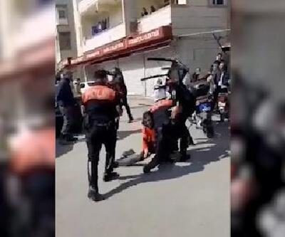 Gözaltı işlemine tepki gösterenler ile polis arasında arbede: 4 yaralı
