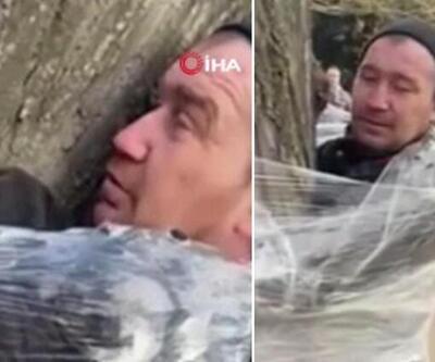 Yağmacı olduğu iddia edilen Rus vatandaşını ağaca bağladılar