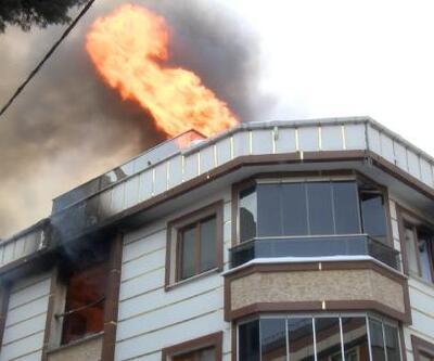  Alev alev yanan binadaki 5 kişi dumandan etkilendi