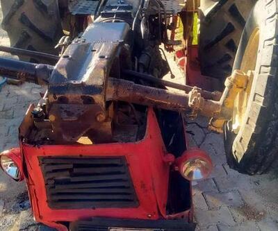 Devrilen traktörün altında kalan sürücü yaralandı