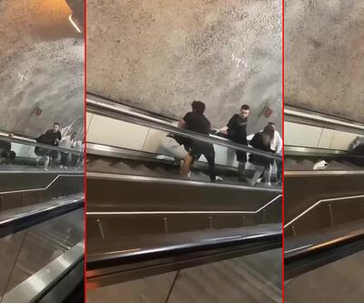 Metroda pes dedirten kavga: Yürüyen merdivenlerde yuvarlanarak kavga ettiler