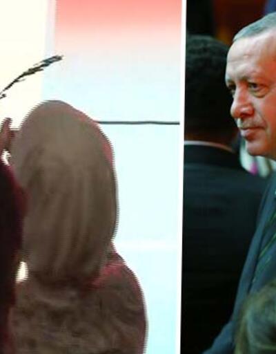 Cumhurbaşkanı Erdoğan kürsüdeki Zeytin Dalı'nı eşine uzattı