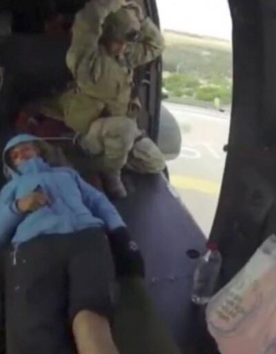 Yaralı dağcı için helikopterli kurtarma operasyonu | Video